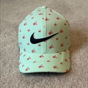 Men’s Nike Light Green Hat with Coral Butterfly Design